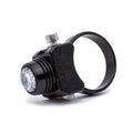 Black rechargeable light held in its round bar clamp, lens facing left