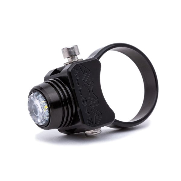 Black rechargeable light held in its round bar clamp, lens facing left