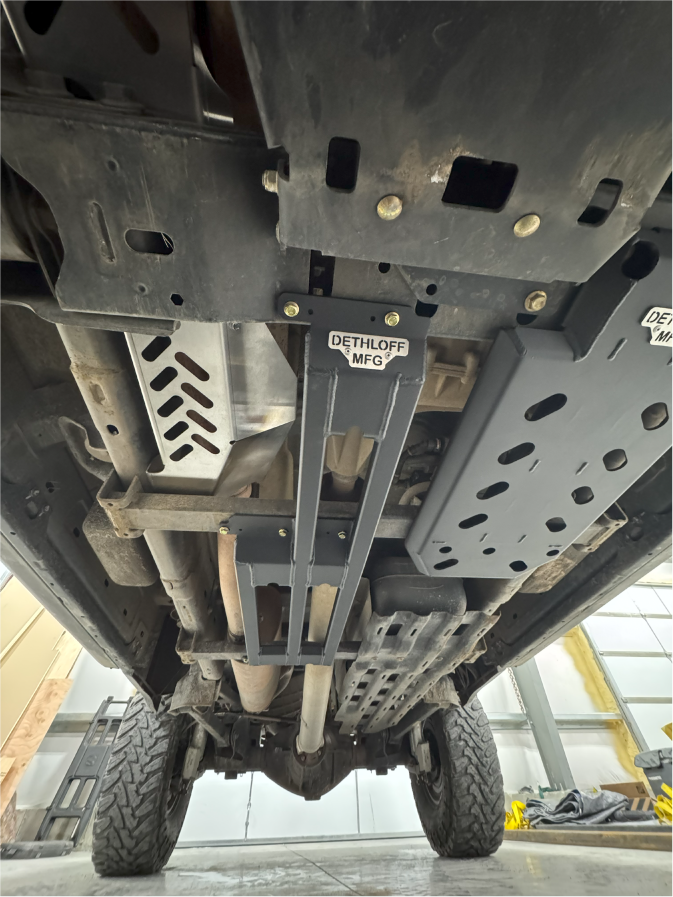 The bar guard fitted under the truck between the existing skid plates