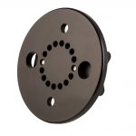 The black mounting plate face on, bolt pattern ringing its center