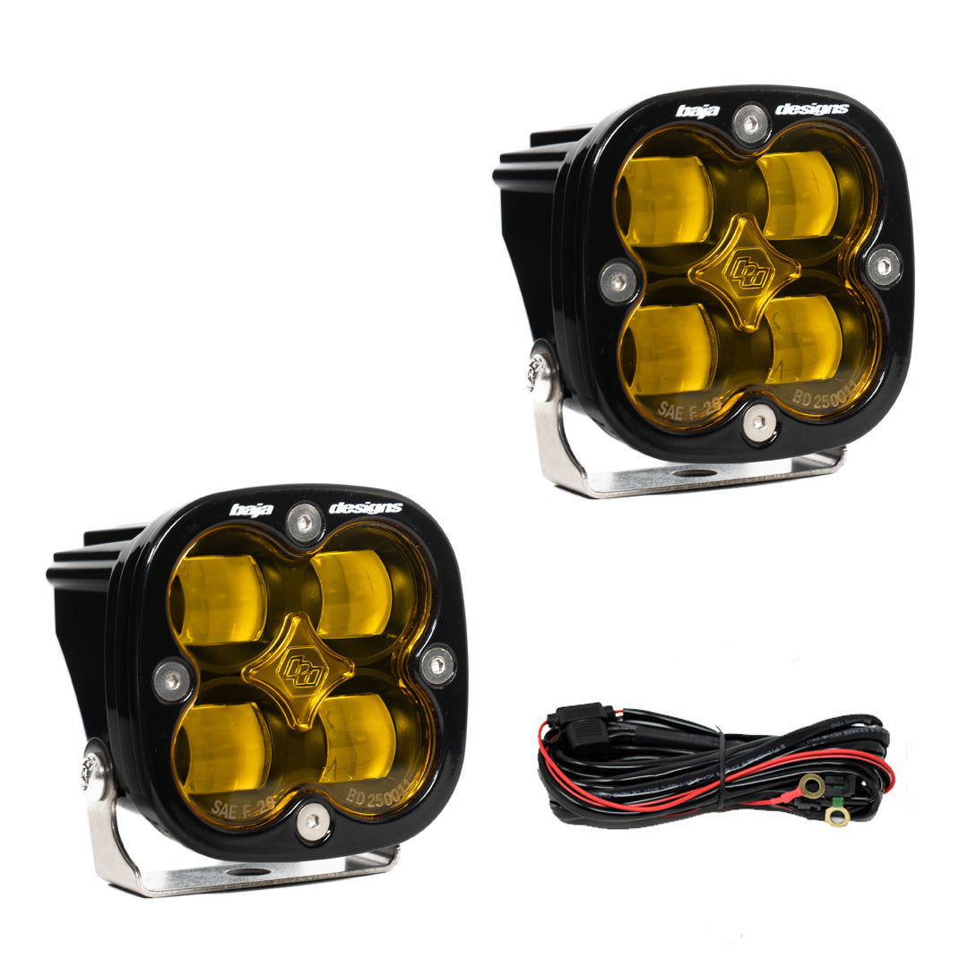 Two square pods with amber lenses over four optics, shown with a black wiring harness