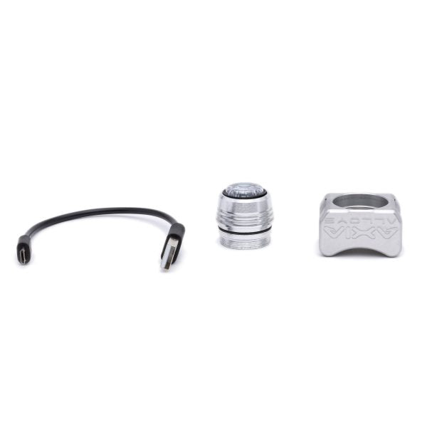 Silver version broken into its parts: charging cable, light body and bar clamp