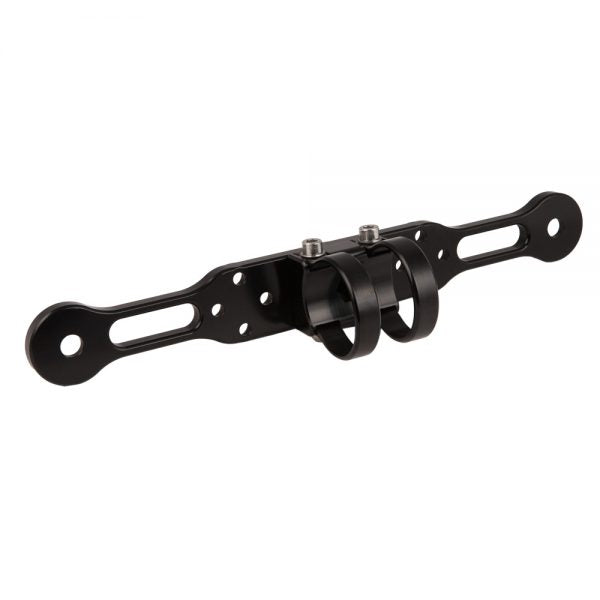 A single mounting arm with its round clamp block, seen from above