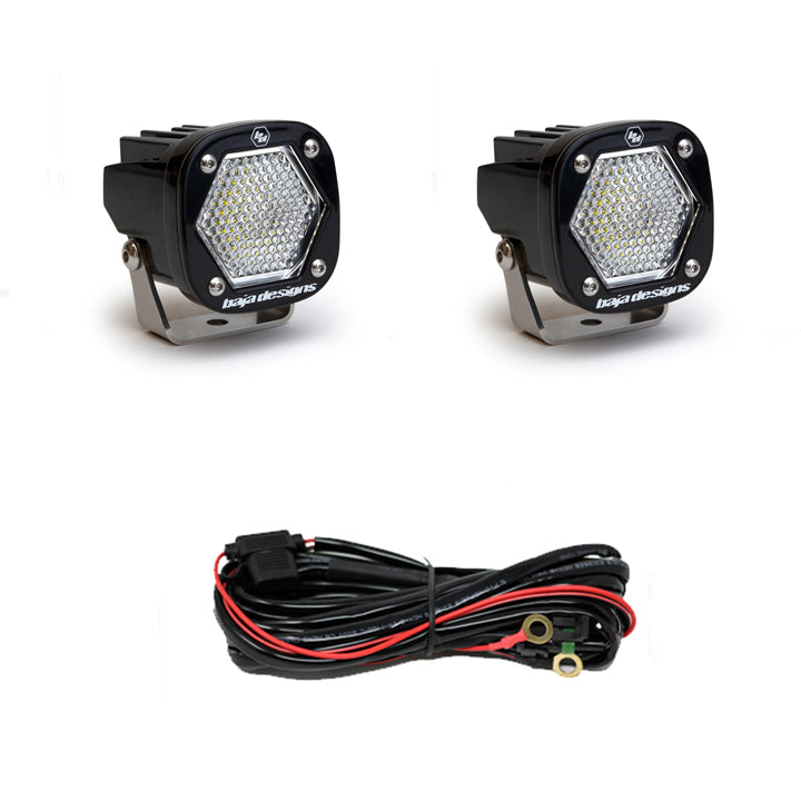Pair of clear-lens pods with work/scene optics, shown with the black wiring harness