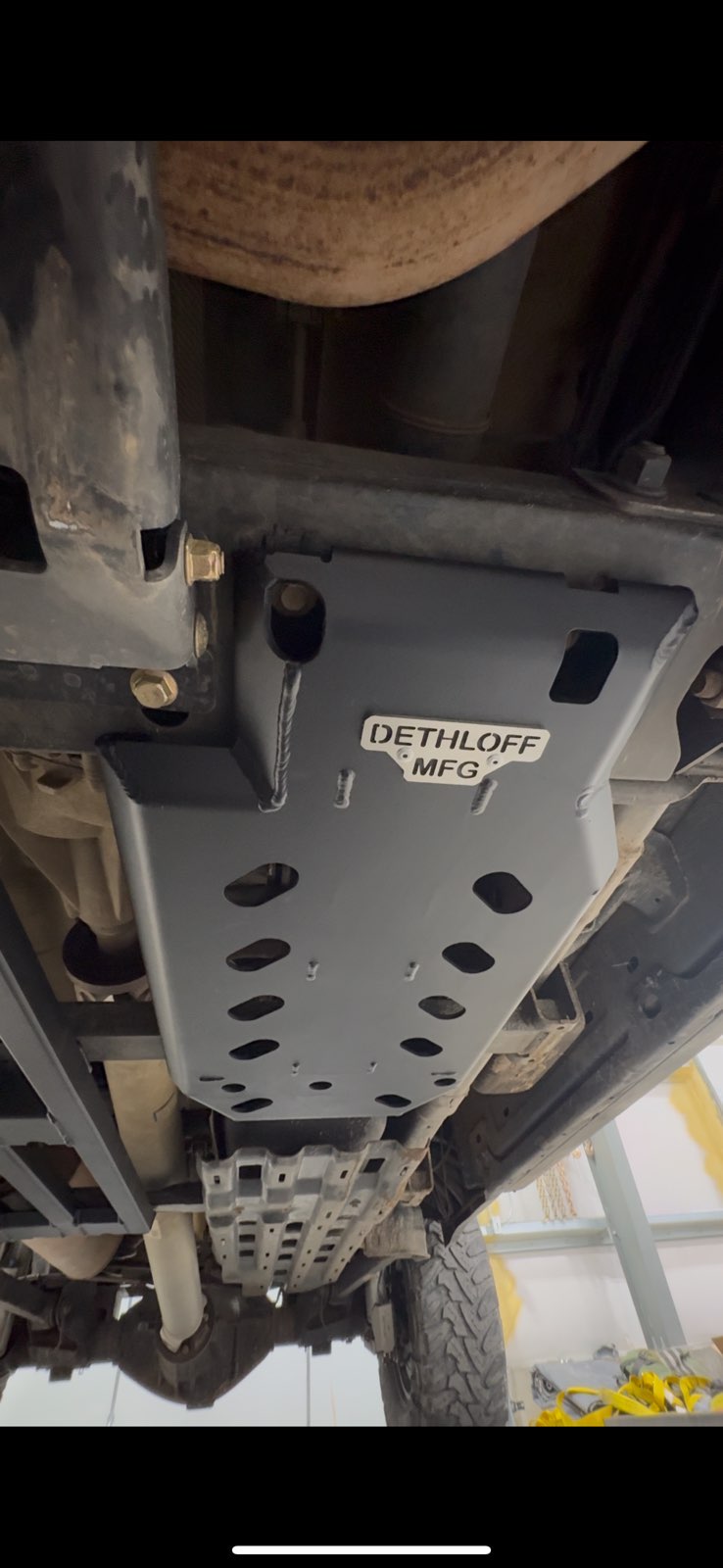 The guard fitted under the truck, seen from the rear looking forward