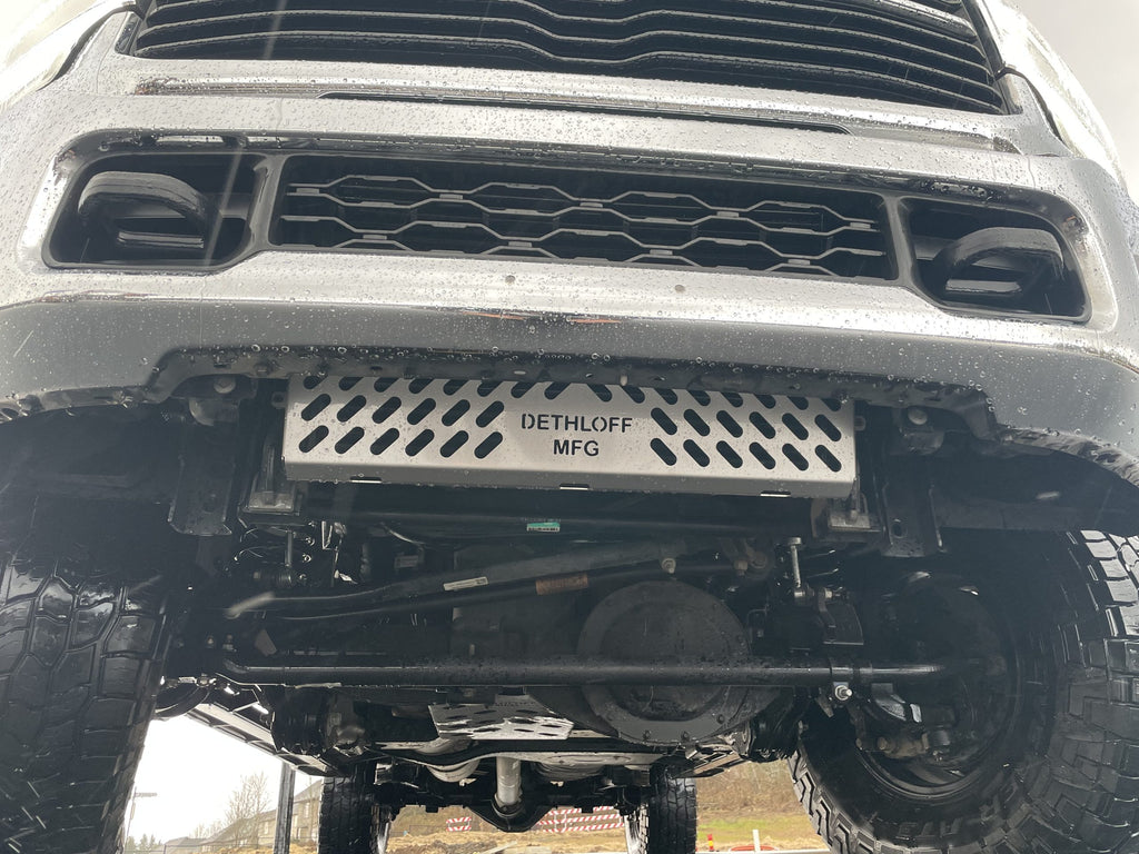 Head-on view of the truck's lower bumper with the perforated guard fitted across it