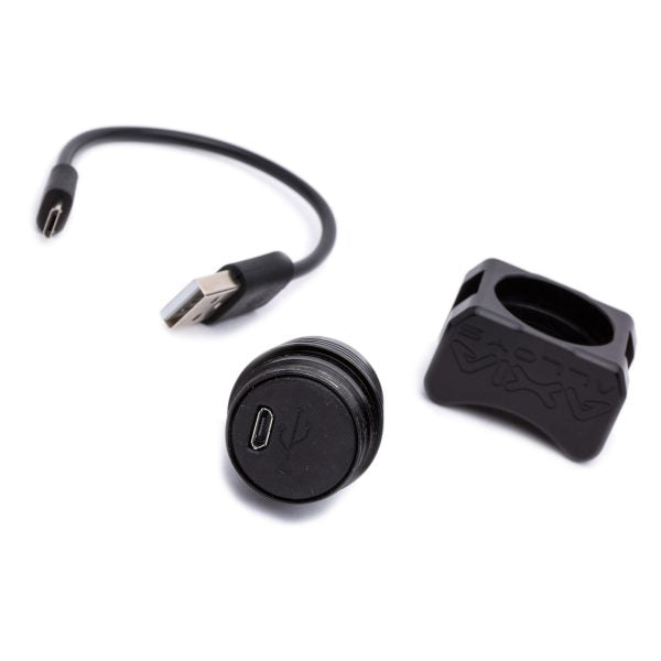 Black version broken into its parts: USB charging cable, light body and bar clamp