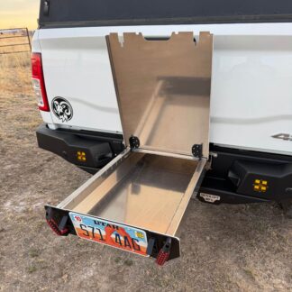 The drawer pulled out and empty, its lid propped open