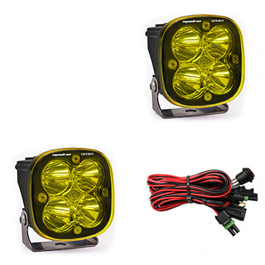 Pair of amber-lens pods with work/scene optics, shown with the wiring harness
