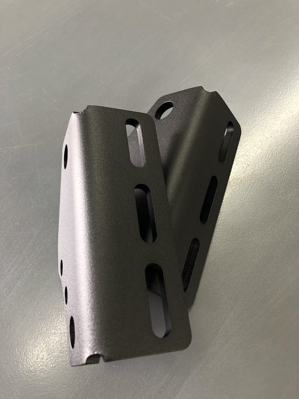 Two brackets set together to show how they pair up