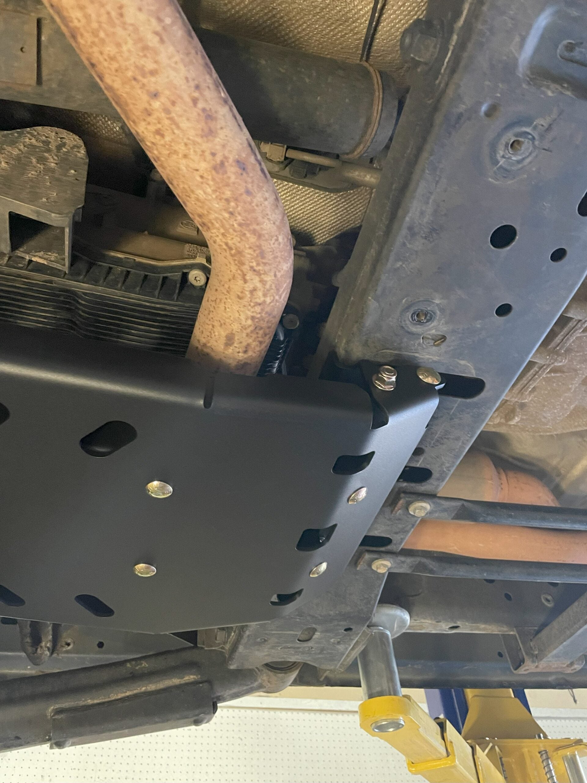 The armor fitted under the truck, transmission cooler and exhaust alongside