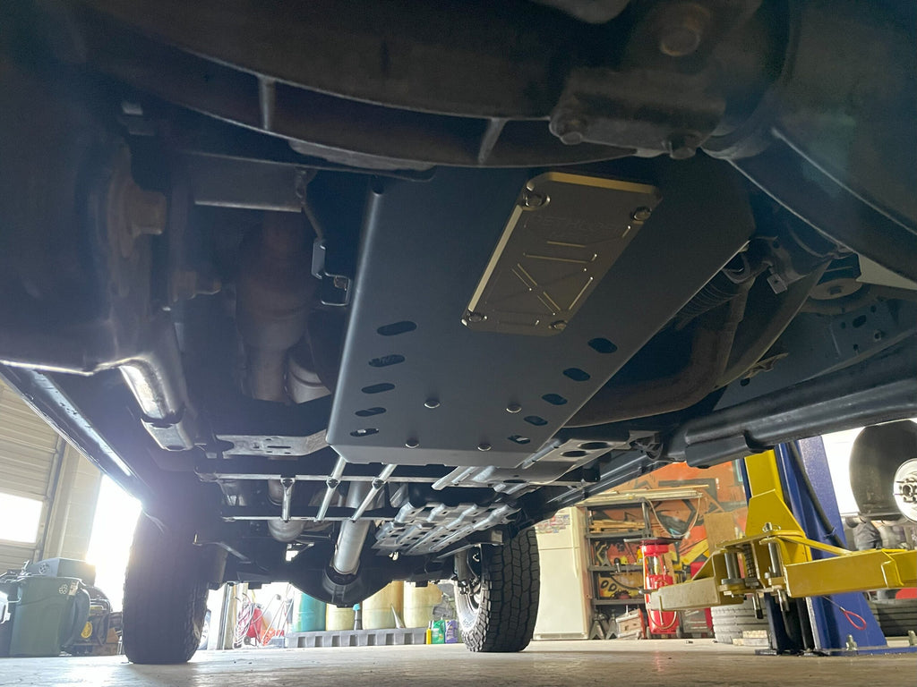 Looking up at the full length of the fitted armor from the front of the truck