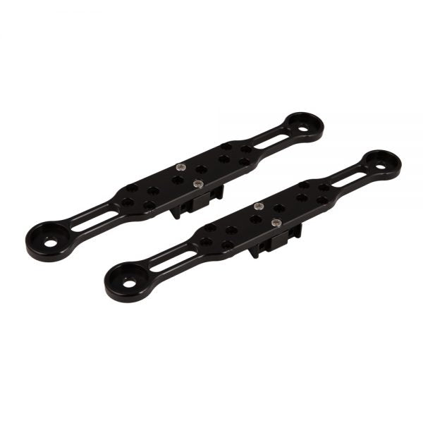 A pair of black mounting arms lying side by side