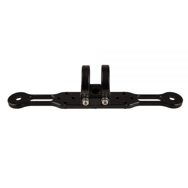 One arm with the clamp jaws standing upright at its center