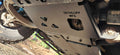 The armor plate fitted under the front of a truck, DETHLOFF MFG stamped on its face