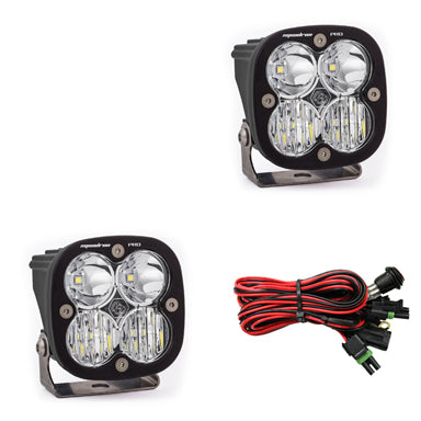 Pair of clear-lens pods with driving/combo optics, shown with the wiring harness